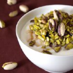 Indulge in Creamy Rice Pudding Topped with Crunchy Pistachios